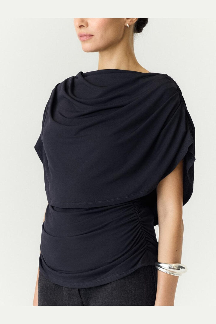 YAS - Yasdrala Cape Top Story - 5185840 Asphalt